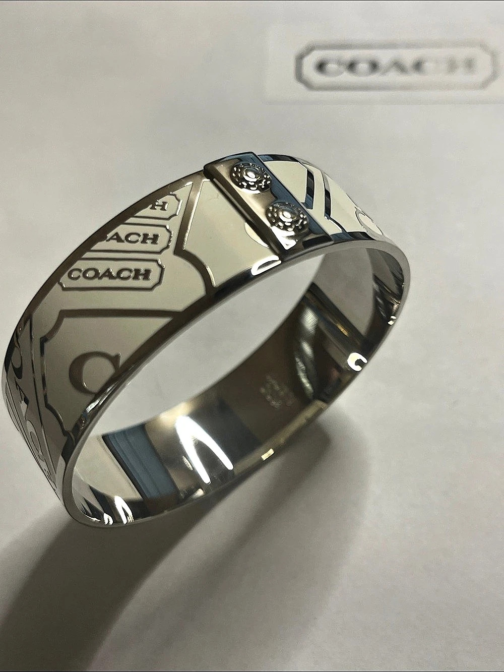Coach Signature Enamel Hinged Bangle Monogram Bangle Bracelet in Silver & White